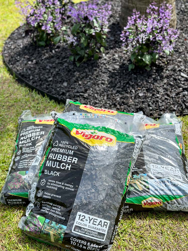 Premium Rubber Mulch in bags and layed on ground. 